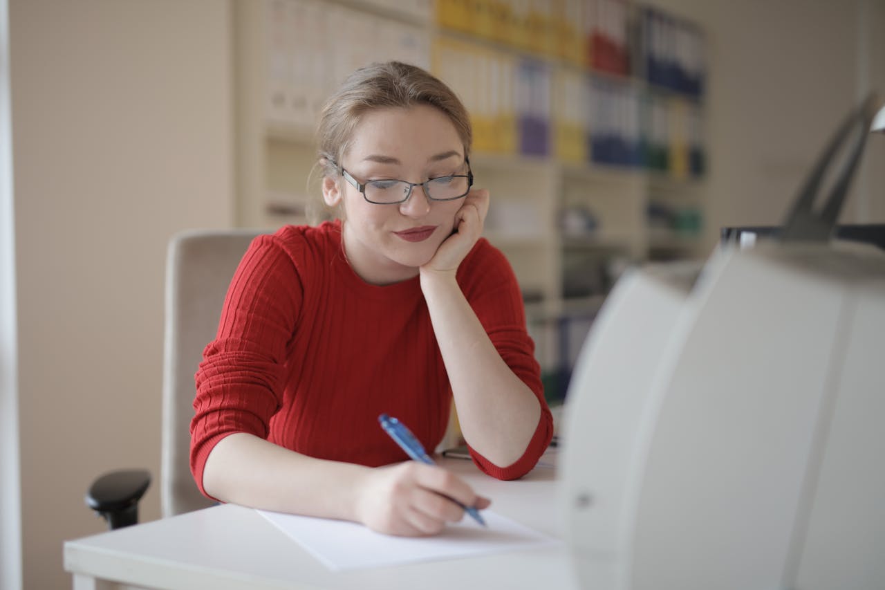 woman with adhd sitting at desk focusing on work