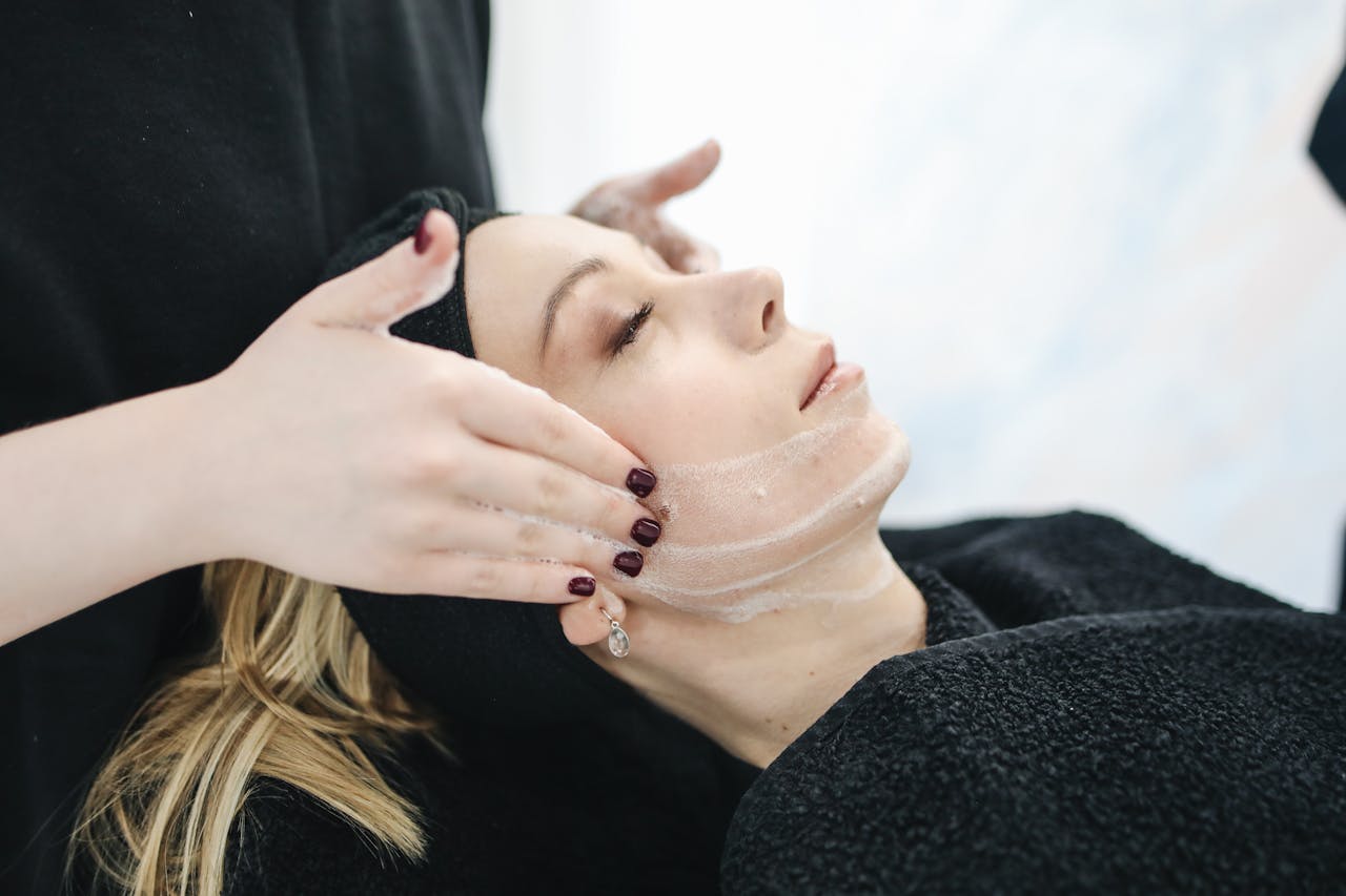 woman receiving skin care treatment