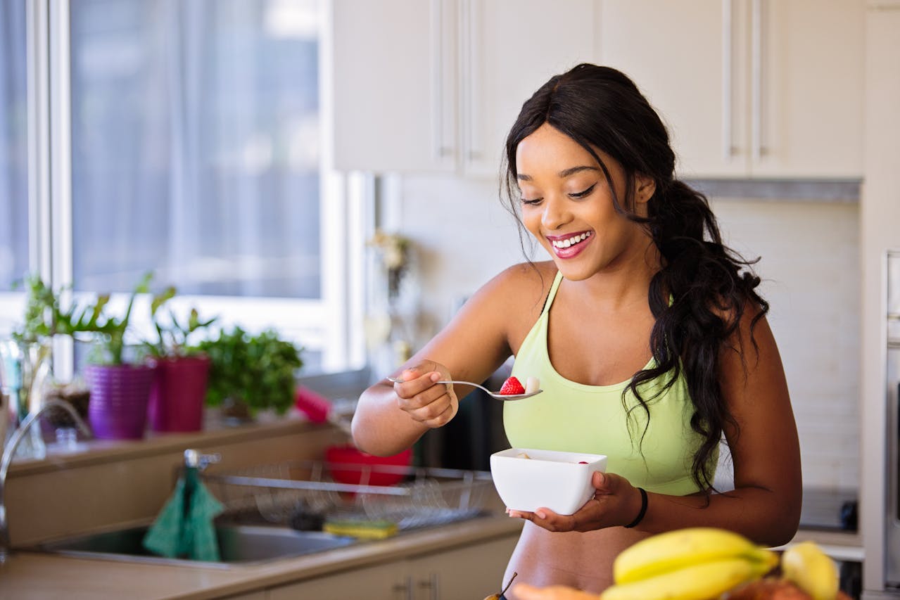 woman eating healthy foods to boost her immunity